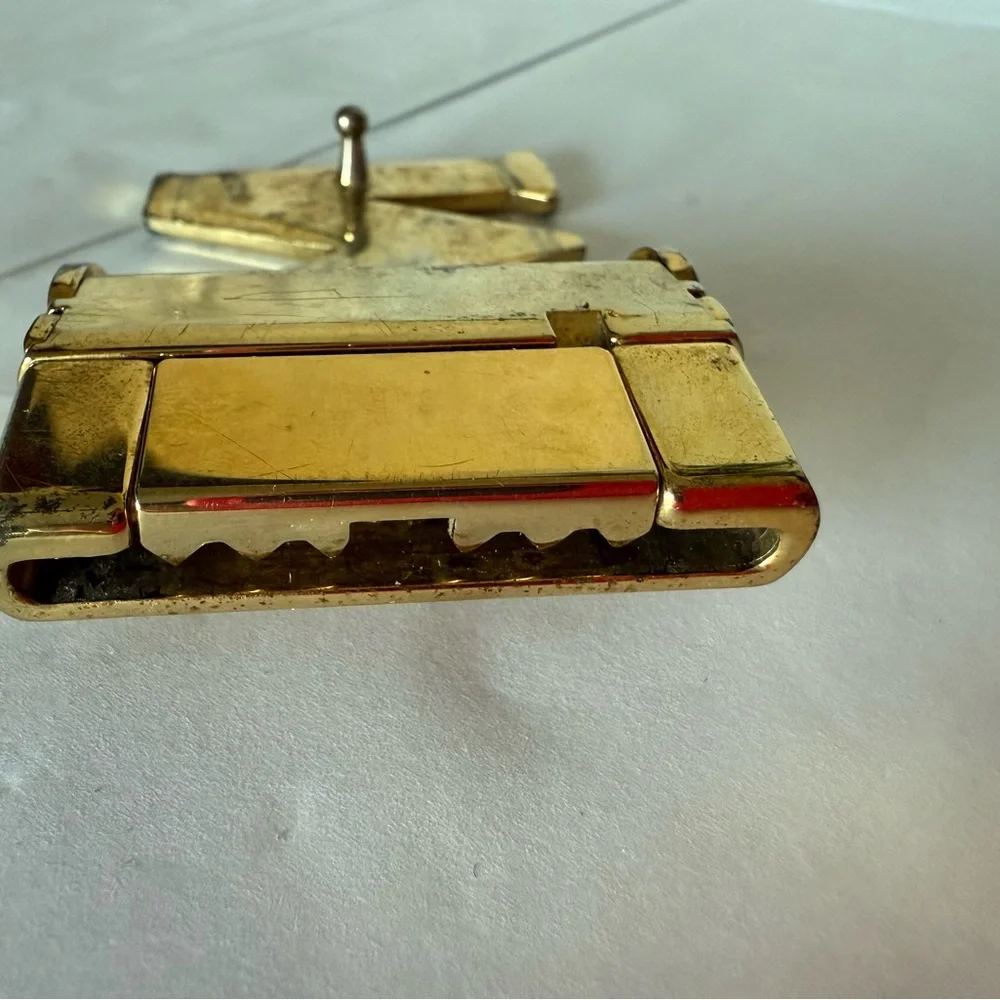 MCM heavy gold belt buckle.